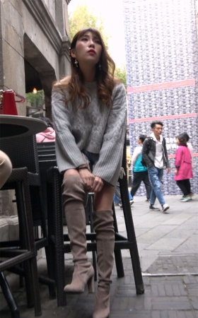 性感大长腿长靴热裤美女